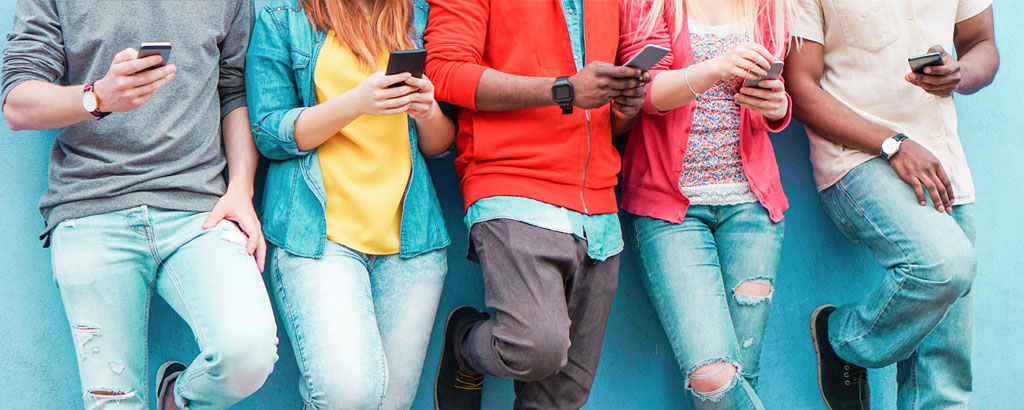 Teens using mobile phones